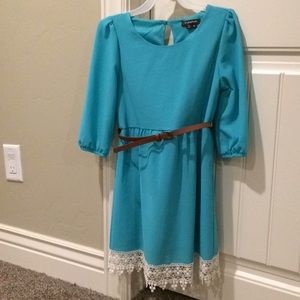 Turquoise dress with lace edge